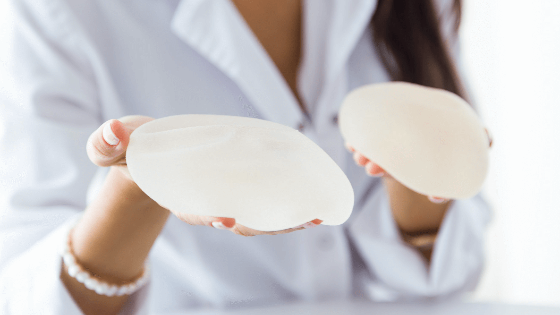How Do I Choose Between Silicone And Saline Breast Implants?